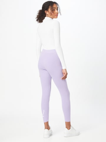 Skinny Leggings di Karl Kani in lilla