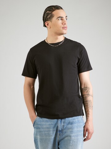 PEAK PERFORMANCE - Camiseta en negro: frente