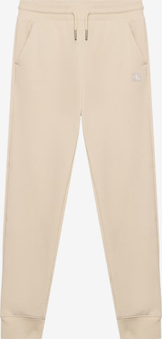 Calvin Klein Jeans - Tapered Pantalón en beige: frente