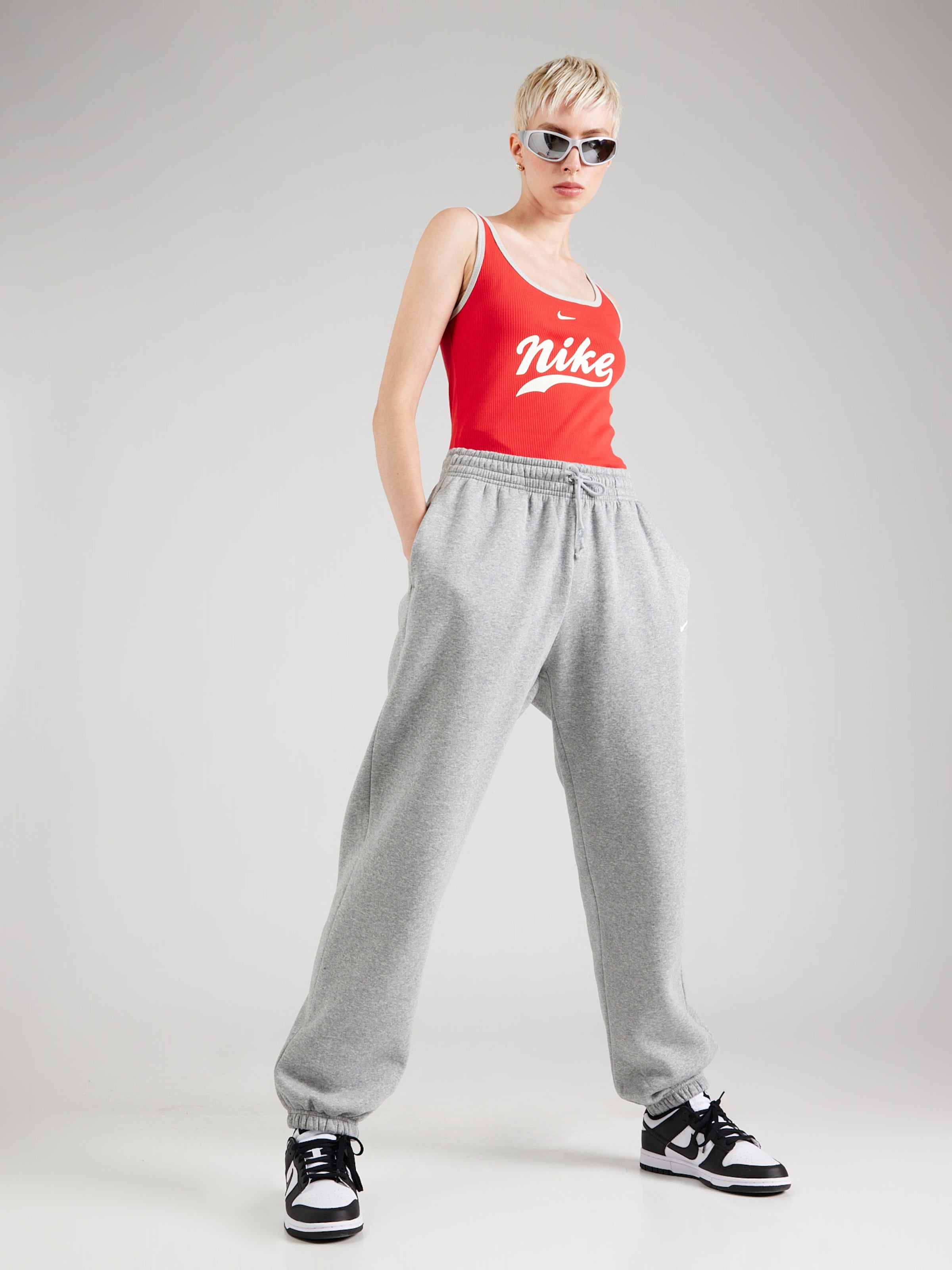 nike tracksuit top and bottoms womens