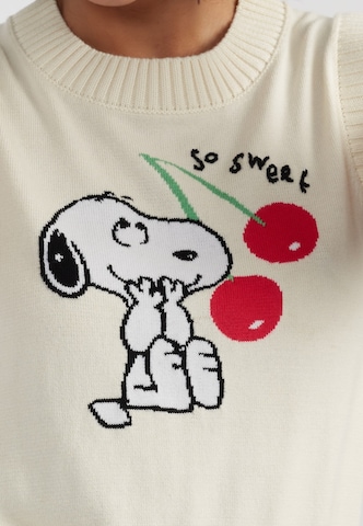 Chinti & Parker Neulepaita 'Snoopy Cherry' värissä beige