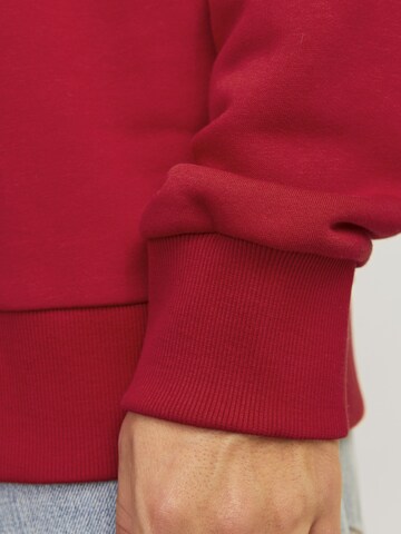 Sweat-shirt 'JJXMAS JOLLY' JACK & JONES en rouge