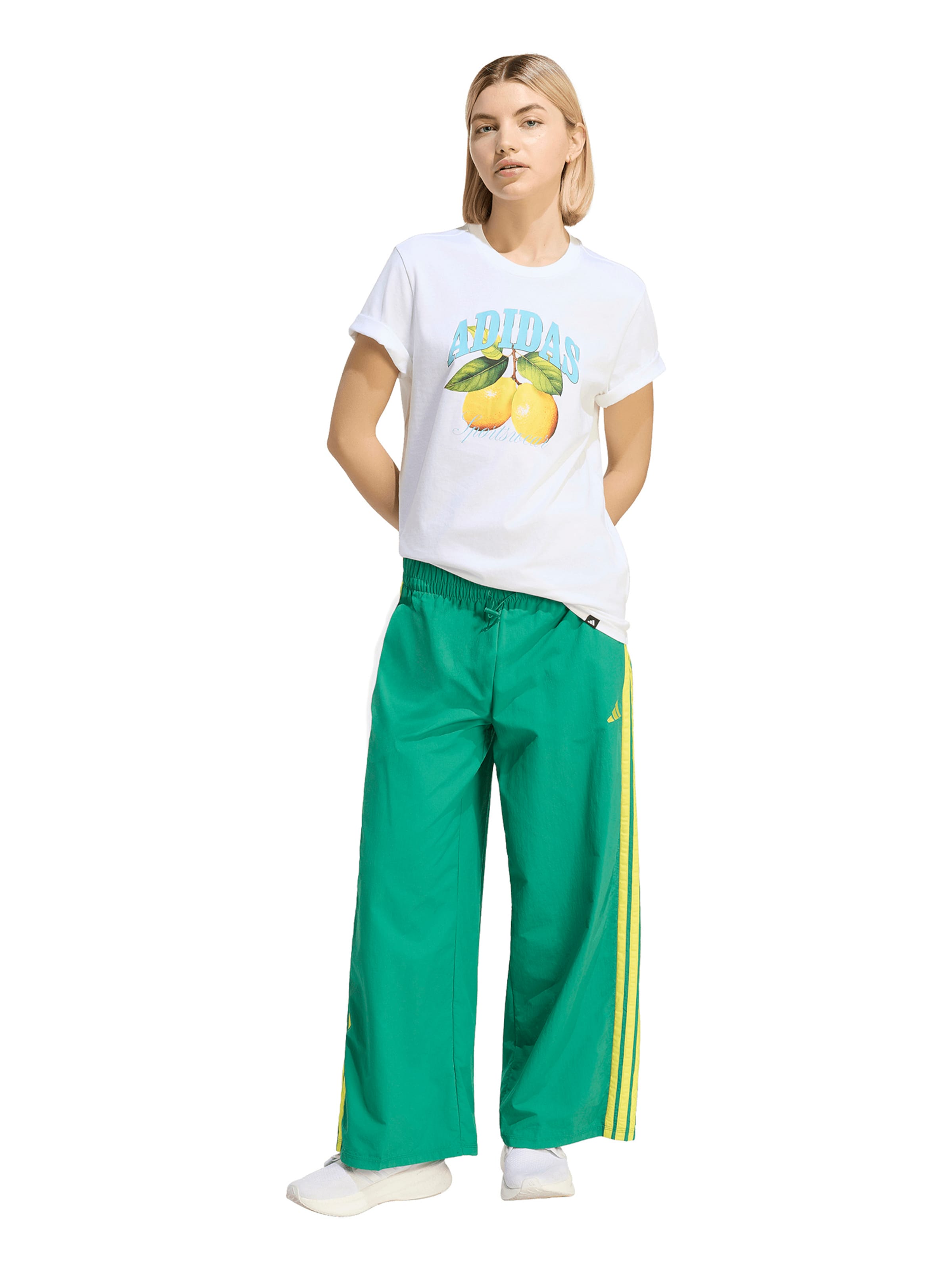 ADIDAS SPORTSWEAR Baggy Спортивные штаны 'Essentials' в Зеленый