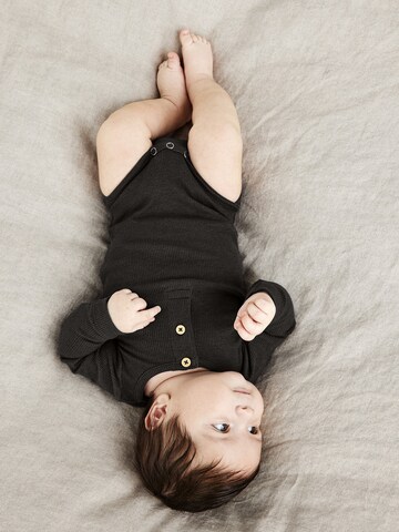 NAME IT - Pijama entero/body 'KAB' en negro: frente