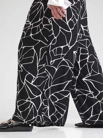 ONLY Carmakoma Wide leg Pants 'CARELICIA' in Black