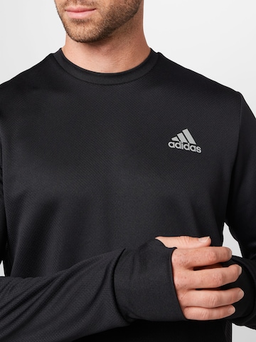 ADIDAS SPORTSWEAR Sweatshirt 'Own The Run Colorblock' in Schwarz