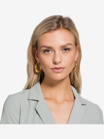 CHRIST Earrings in Gold: front