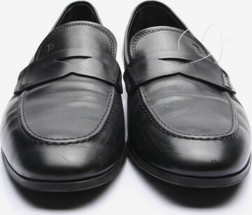 Tod's Flats & Loafers in 42 in Black
