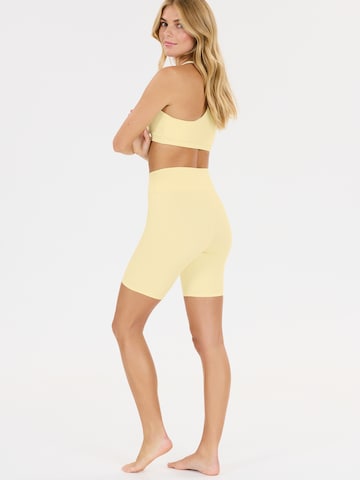 Skinny Pantaloni sport de la Athlecia pe galben