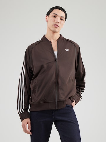 ADIDAS ORIGINALS Prehodna jakna 'BRITCORE' | rjava barva: sprednja stran