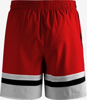 UNDER ARMOUR Loose fit Workout Pants in Red