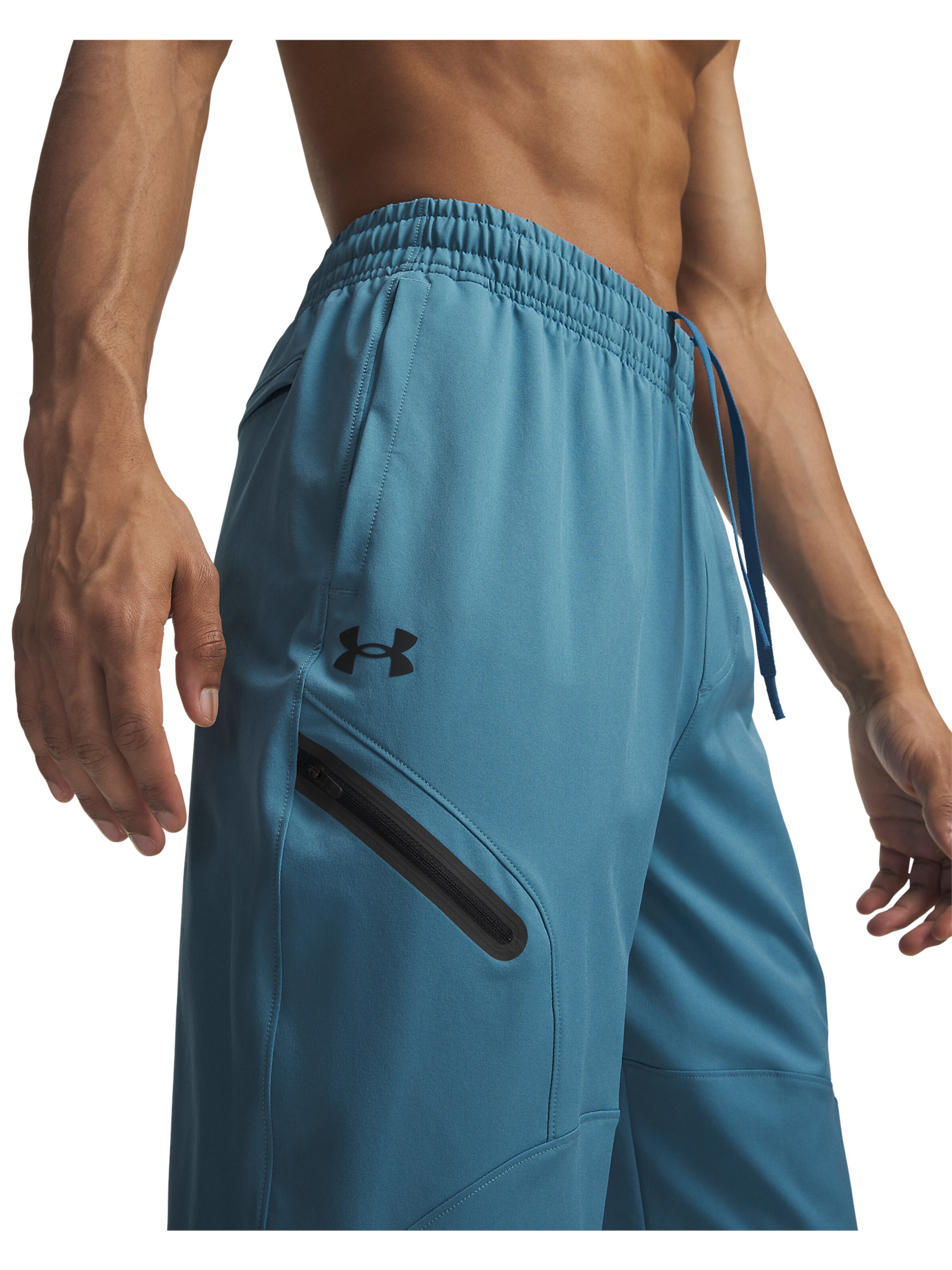 UNDER ARMOUR Tapered Sportbroek 'Unstoppable' in Blauw