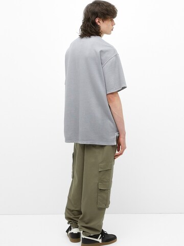 Pull&Bear Loose fit Cargo trousers in Green