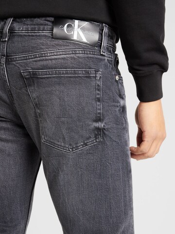 Calvin Klein Jeans Slimfit Jeans 'SLIM' i grå