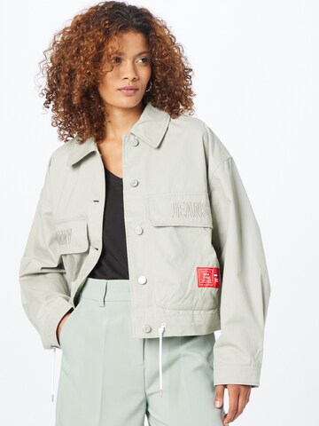 Tommy Jeans Between-season jacket in Green: front