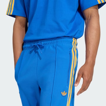 Effilé Pantalon de sport 'Tigres UANL Terrace Icons' ADIDAS ORIGINALS en bleu
