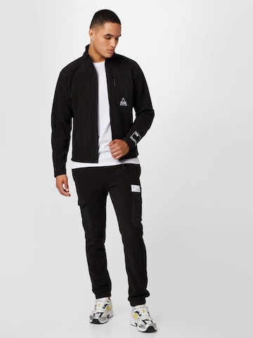 SOS - Tapered Pantalón funcional 'Laax' en negro