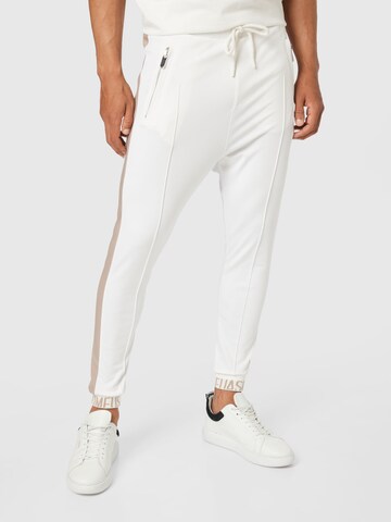 Elias Rumelis Tapered Trousers in White: front