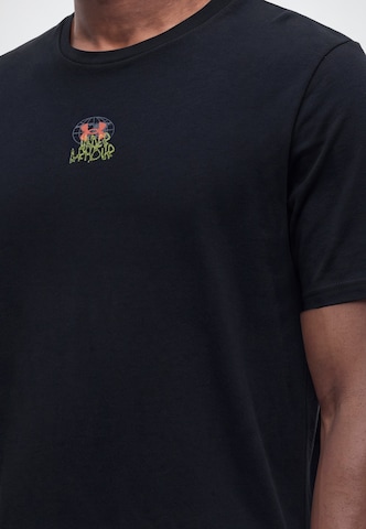 UNDER ARMOUR Koszulka funkcyjna w kolorze czarny