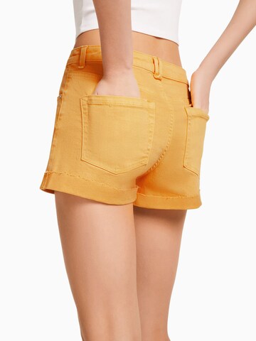 Regular Jean Bershka en jaune