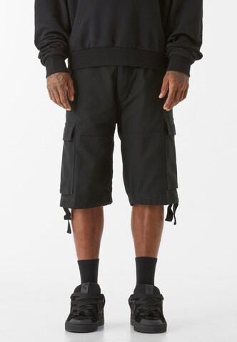 Lost Youth Regular Cargo Pants in Black: front