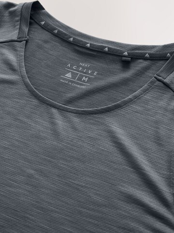 Next - Camiseta funcional en gris