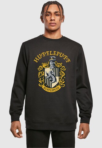ABSOLUTE CULT Sweatshirt 'Harry Potter - Hufflepuff Crest' in Schwarz: Vorderseite