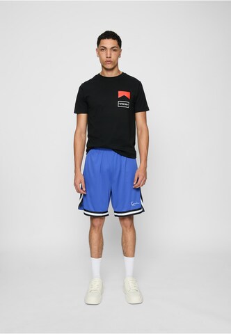 Karl Kani - Loosefit Calças 'Essential' em azul