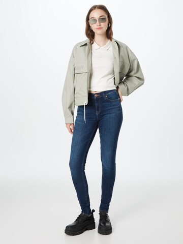 Tommy Jeans Skinny Kavbojke 'NORA' | modra barva