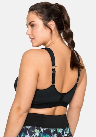SHEEGO - Bustier Sujetador deportivo en negro