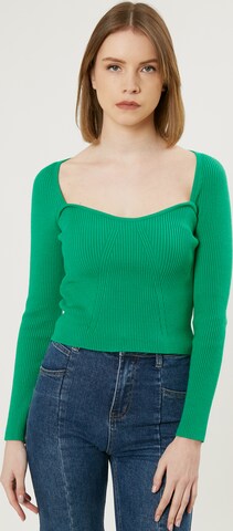 Pull-over Influencer en vert : devant