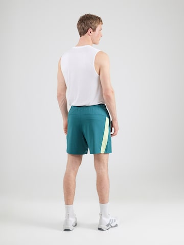 UNDER ARMOUR Loosefit Παντελόνι φόρμας 'Vent' σε πράσινο