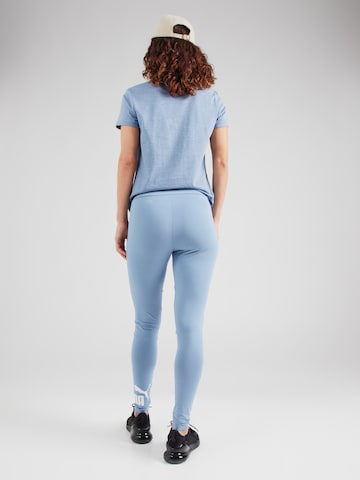 PUMA Skinny Sportbroek 'ESS No. 1' in Blauw