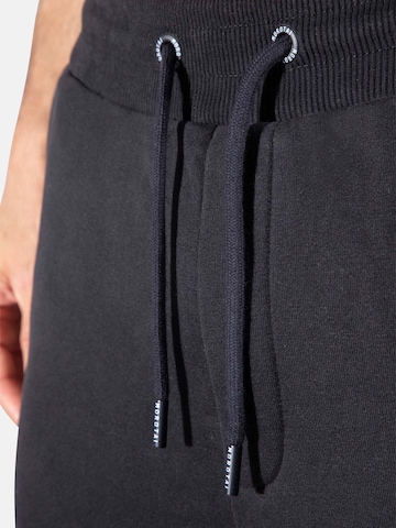 MOROTAI Slimfit Sporthose 'CORPORATE' in Schwarz