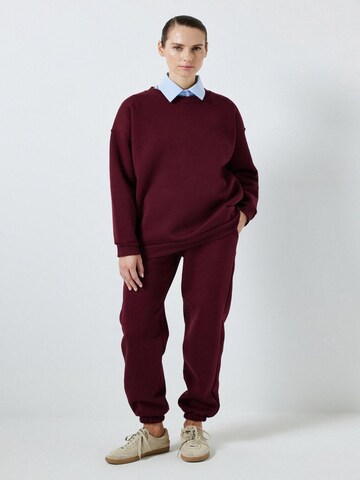Touche Prive Joggingpak in Rood: voorkant