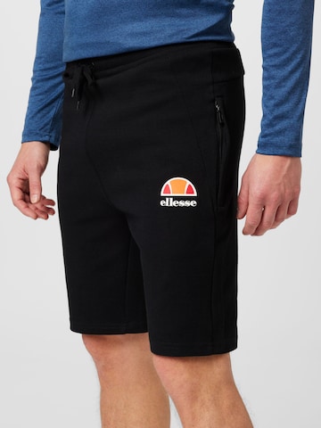 ELLESSE - Regular Calças de desporto 'Kraviz' em preto