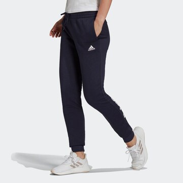 ADIDAS SPORTSWEAR Tapered Workout Pants 'Essentials Fleece Logo' in Blue