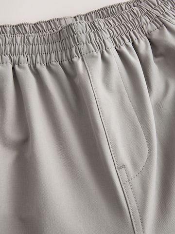 Next Slimfit Cargobroek in Grijs