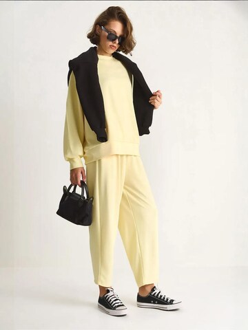 Tuta da jogging di Bianco Lucci in giallo