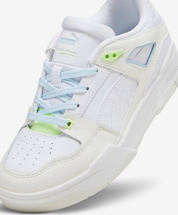 Baskets basses 'Slipstream' PUMA en blanc