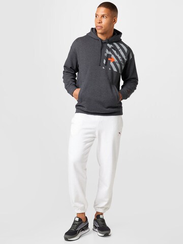 PUMA - Tapered Pantalón deportivo en blanco