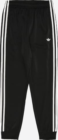 ADIDAS ORIGINALS Trousers in Black: front