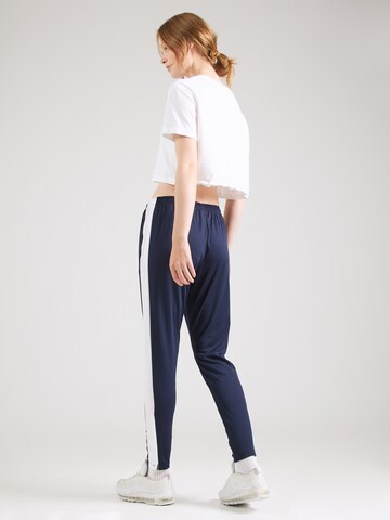 NIKE - Tapered Pantalón deportivo 'ACADEMY' en azul