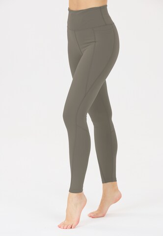 Athlecia Skinny Sportbroek 'Aliya' in Groen