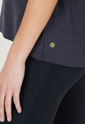 Athlecia Sports top 'Mota' in Grey