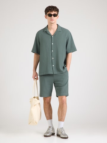 SELECTED - Ajuste confortable Ropa para correr 'SLHRLXCAL' en verde