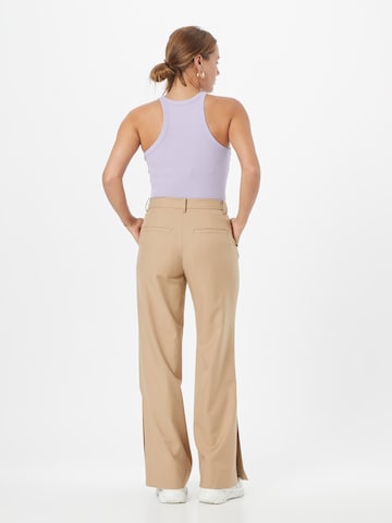 WEEKDAY Wide leg Pressveckad byxa 'Kylie' i beige