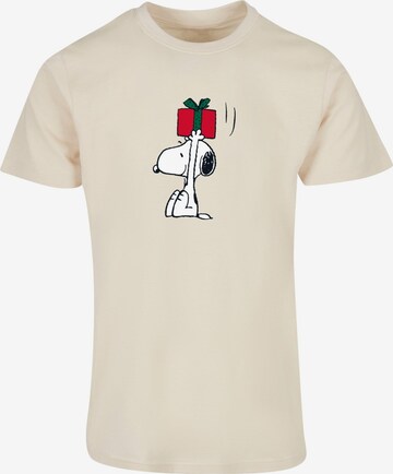 Merchcode T-Shirt 'Peanuts Snoopys Present' in Beige: predná strana