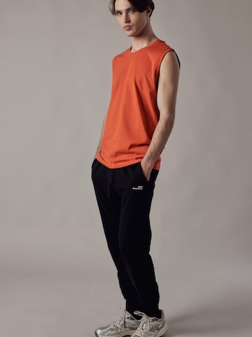 Maglietta 'Canotta' di OWN Off With Nature in arancione