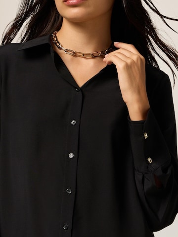 oltre Bluse‌‌‌ in Schwarz